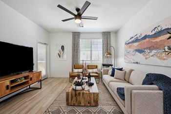 a living room with a couch and a tv